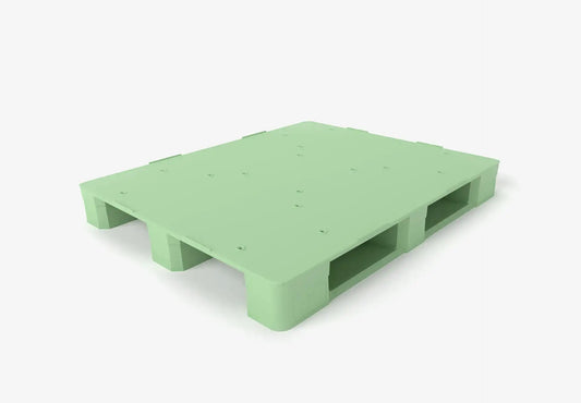 Green plastic pallet on a white background